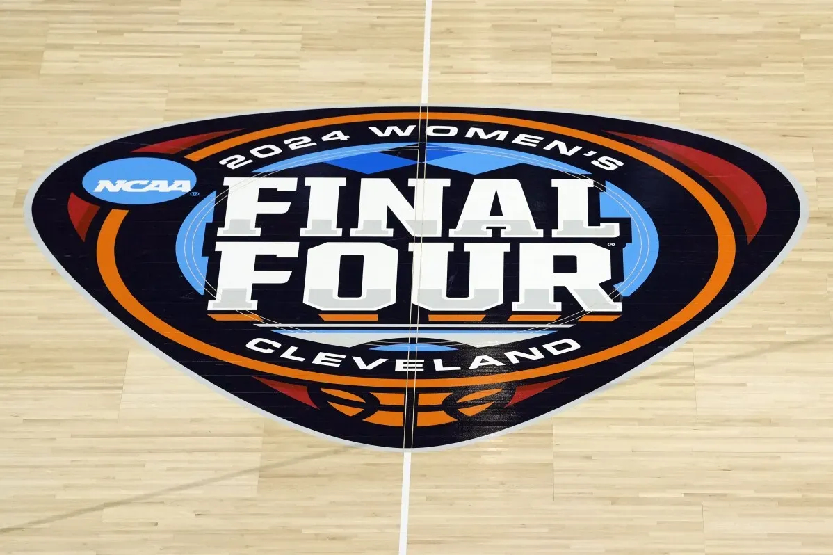 شعار بطولة NCAA لكرة السلة للسيدات 2024 \"فاينال فور\" في كليفلاند، مع تصميم ملون يمثل الحدث الرياضي المهم.