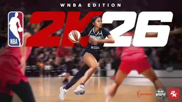 أنجيل ريس تحمل كرة سلة أثناء اللعب، مع شعار NBA 2K26 وإصدار WNBA في الخلفية، تعكس روح تمثيل النساء في كرة السلة.