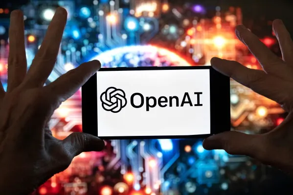 شاشة هاتف تعرض شعار OpenAI مع خلفية رقمية تشير إلى الهجمات الإلكترونية ونماذج الذكاء الاصطناعي المستقلة.
