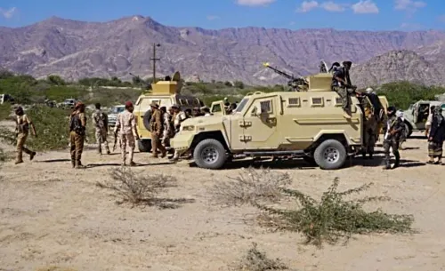 أخبار عاجلة عن انسحاب الإمارات من اليمن بعد تصعيد التوترات مع السعودية، مع خلفية خريطة العالم.