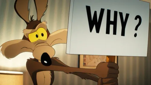 القيوط يحمل لافتة مكتوب عليها "لماذا؟" تعبيراً عن تساؤلات حول قرار Warner Bros. بحذف فيلم "Coyote vs. Acme" رغم نجاحه التجاري.