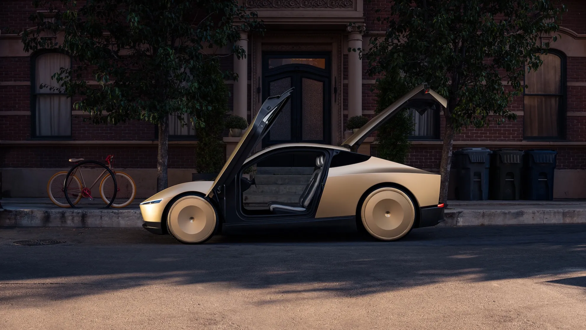مركبة Cybercab ذاتية القيادة من Tesla بلون ذهبي بدون مقود أو أدوات تحكم تقليدية، مخصصة لأساطيل النقل التشاركي.
